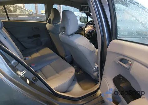 2011 Honda Insight from USA, damaged, VIN JHMZE2H32BS001076